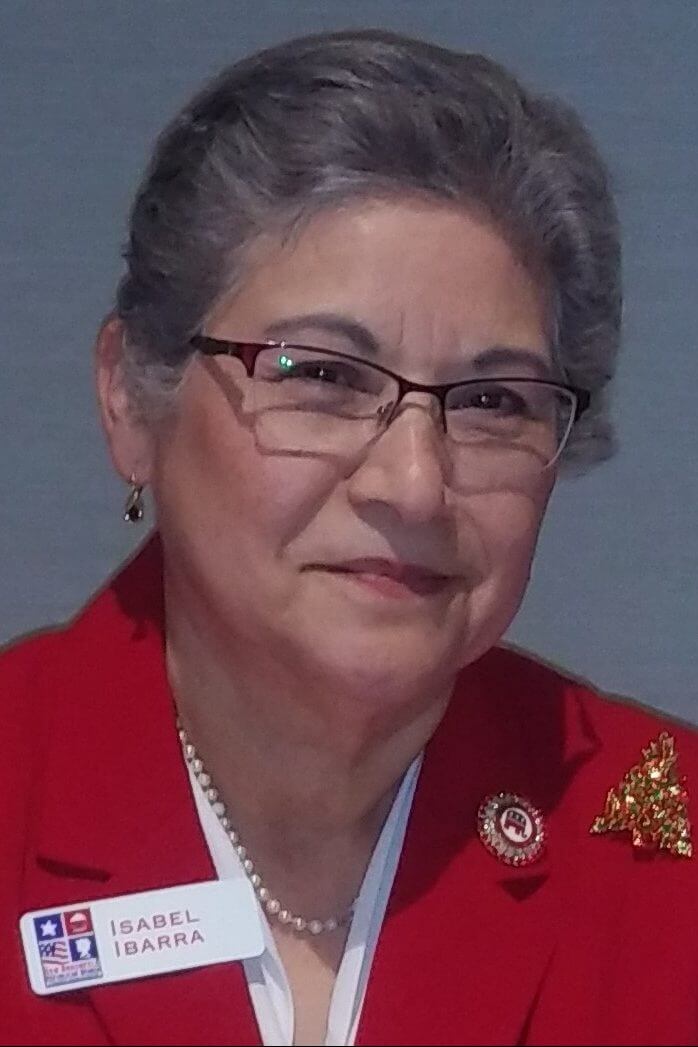 A woman in red jacket and glasses.