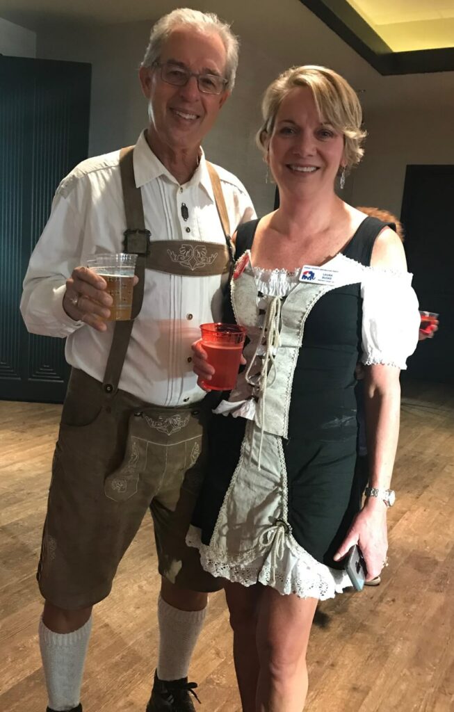 A man and woman dressed in german clothing.